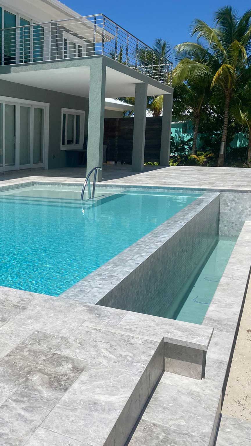 Golden Hour Grandeur: A Cayman Kai Infinity Pool